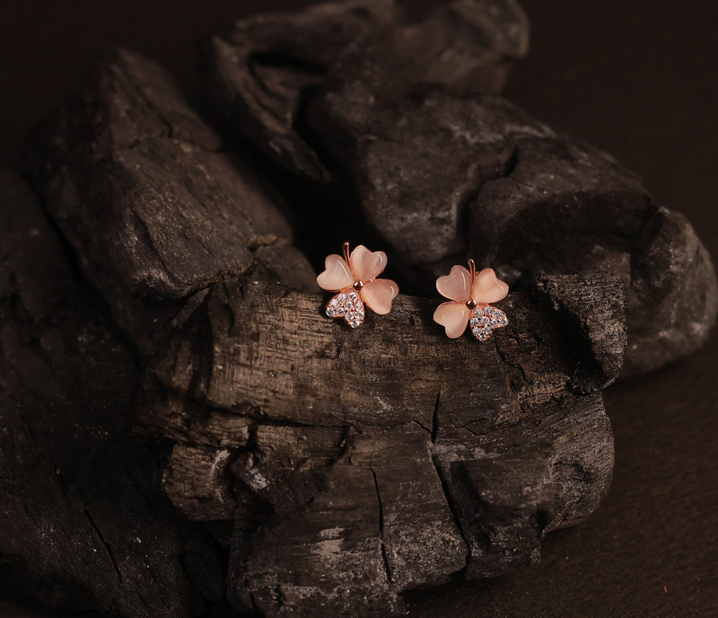 Silver four petal stud with rosegold finish