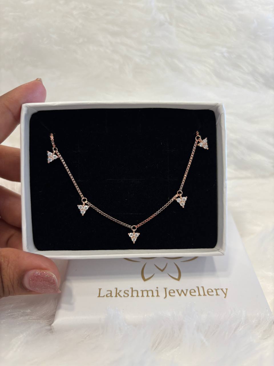 Silver five triangle charm bracelet with rosegold finish Silver five triangle charm bracelet with rosegold finish