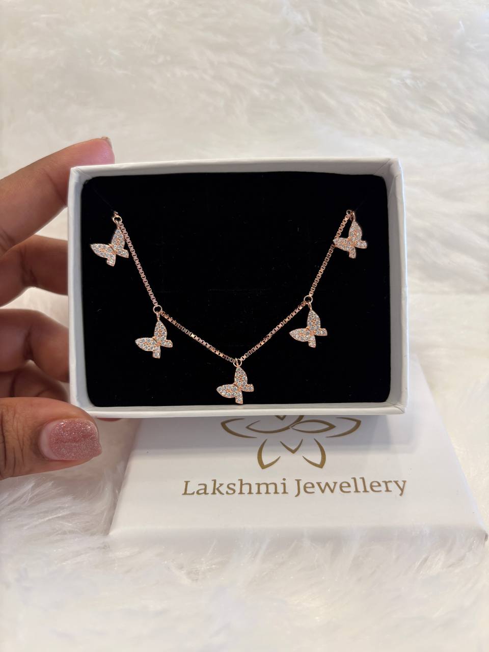 Silver butterfly charms with rosegold finish Silver butterfly charms with rosegold finish