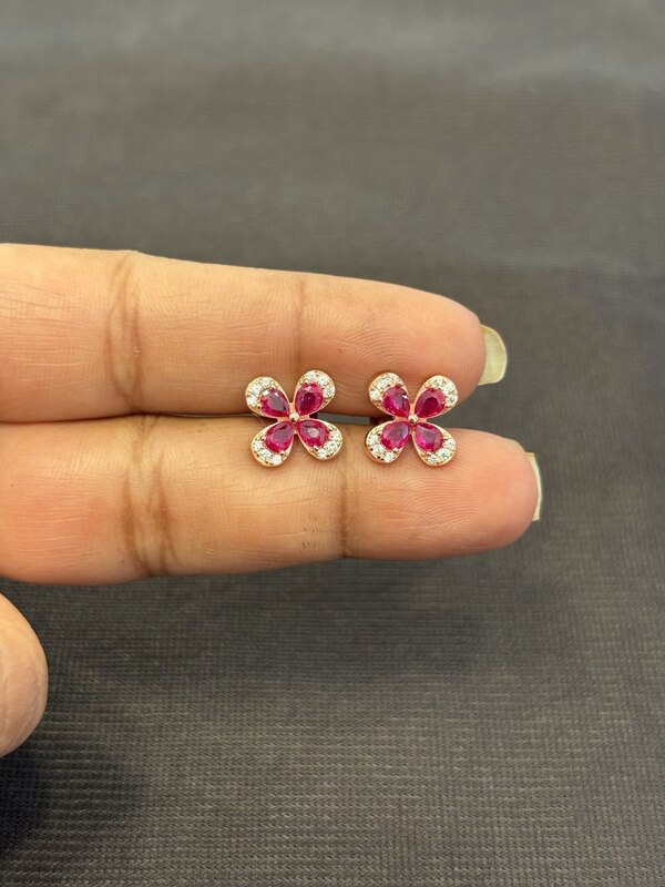 Silver four petal flower pink stud with rose gold finish