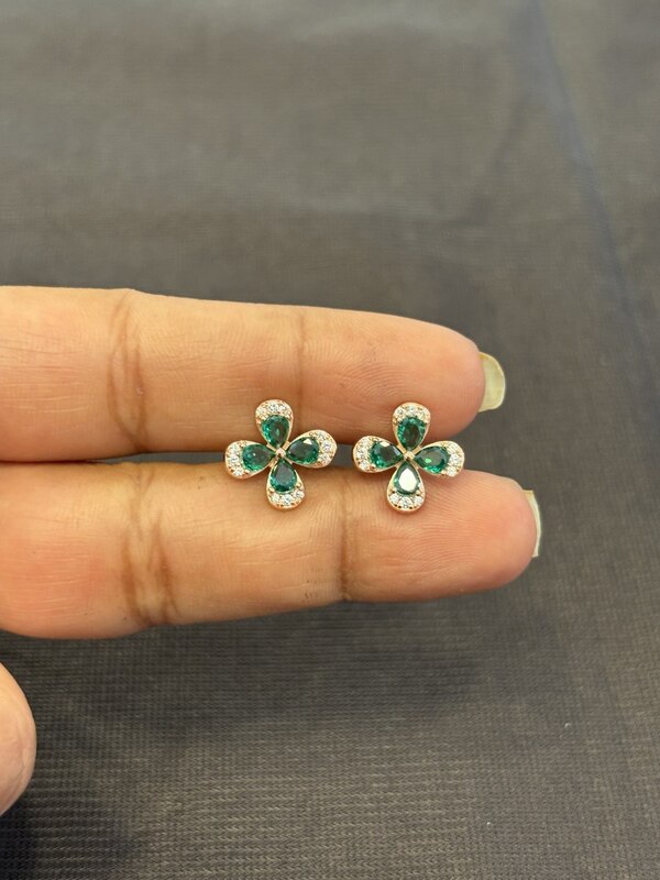 Silver four petal flower green stud with rose gold finish