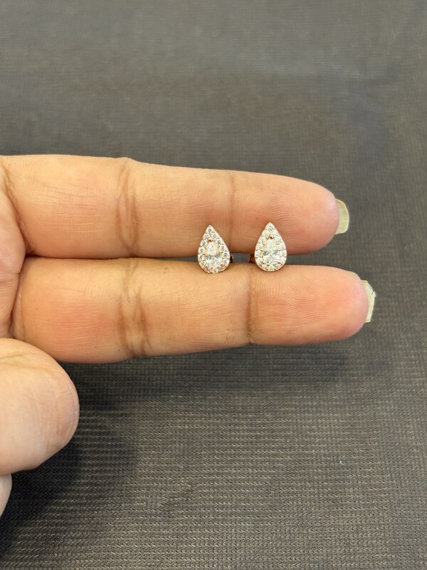Silver drop shape white stud with rose finish