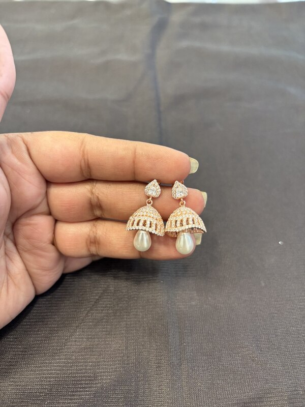 Silver jumka stone earring rose golg finish