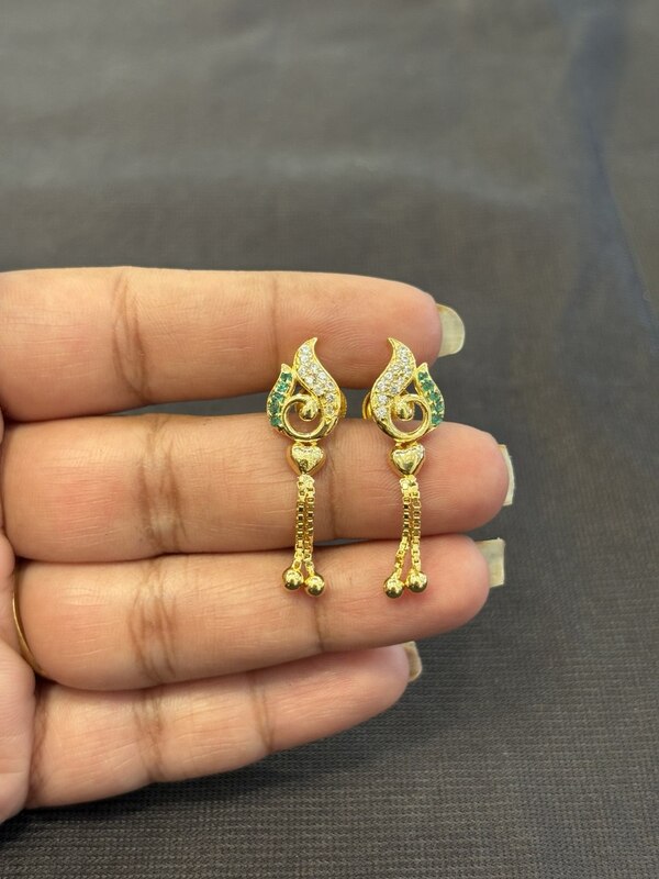 Silver casting peacock stud with gold finish