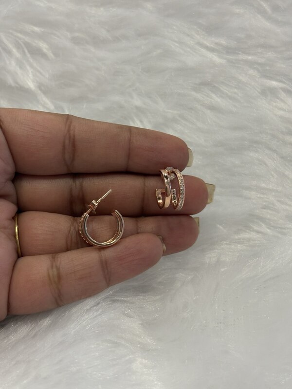 Silver Dhivyam loop with rosegold finish