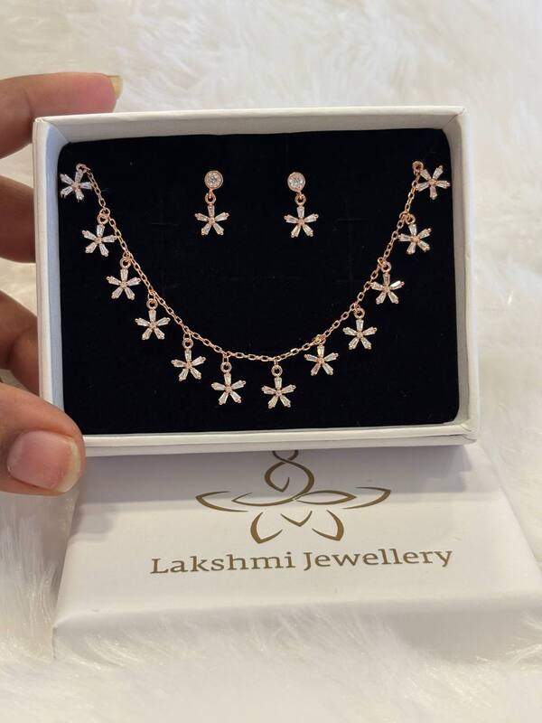 Silver charm pendant set coated with rosegold finish