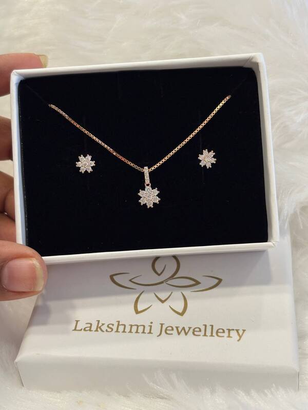 Silver diamond look alike pedant set with rosegold finish