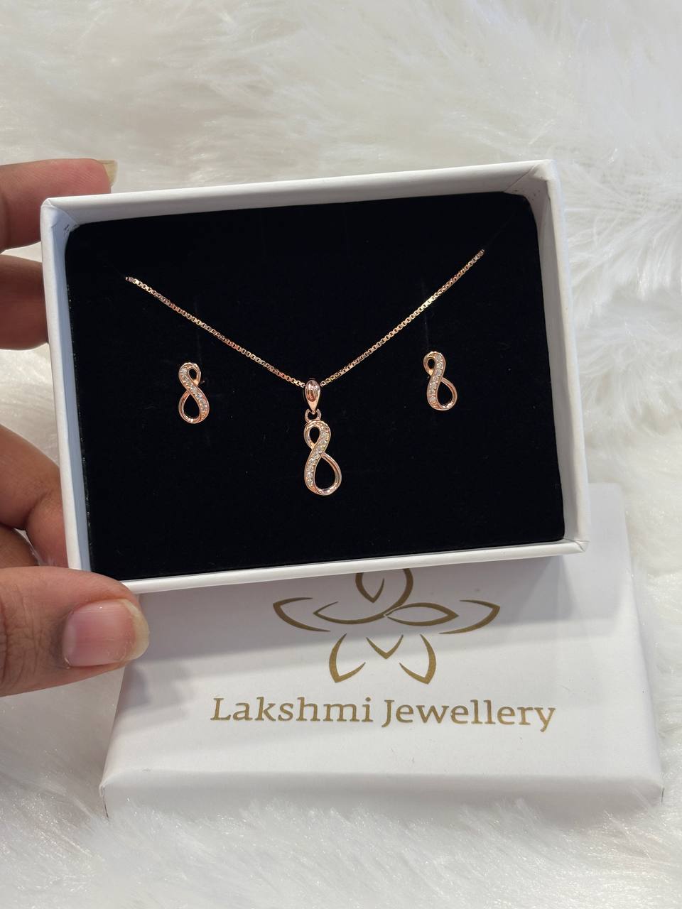 Silver infinity chain pendant set with rosegold finish