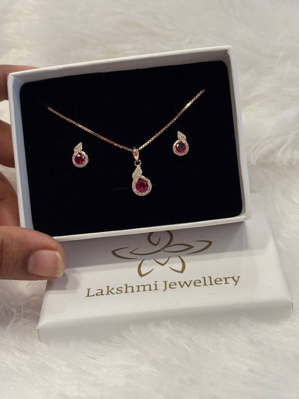 Silver fancy chain pendant set coated with rosegold finish