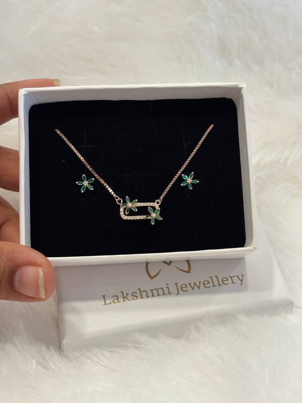 Silver green four flower chain pendant set with rosegold finish