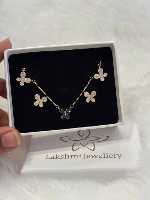 Silver butterfly chain pendant set with rosegold finish