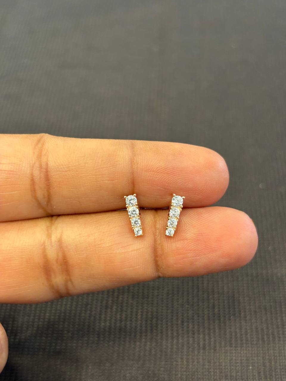 Silver four stone straight second stud with rosegold finish