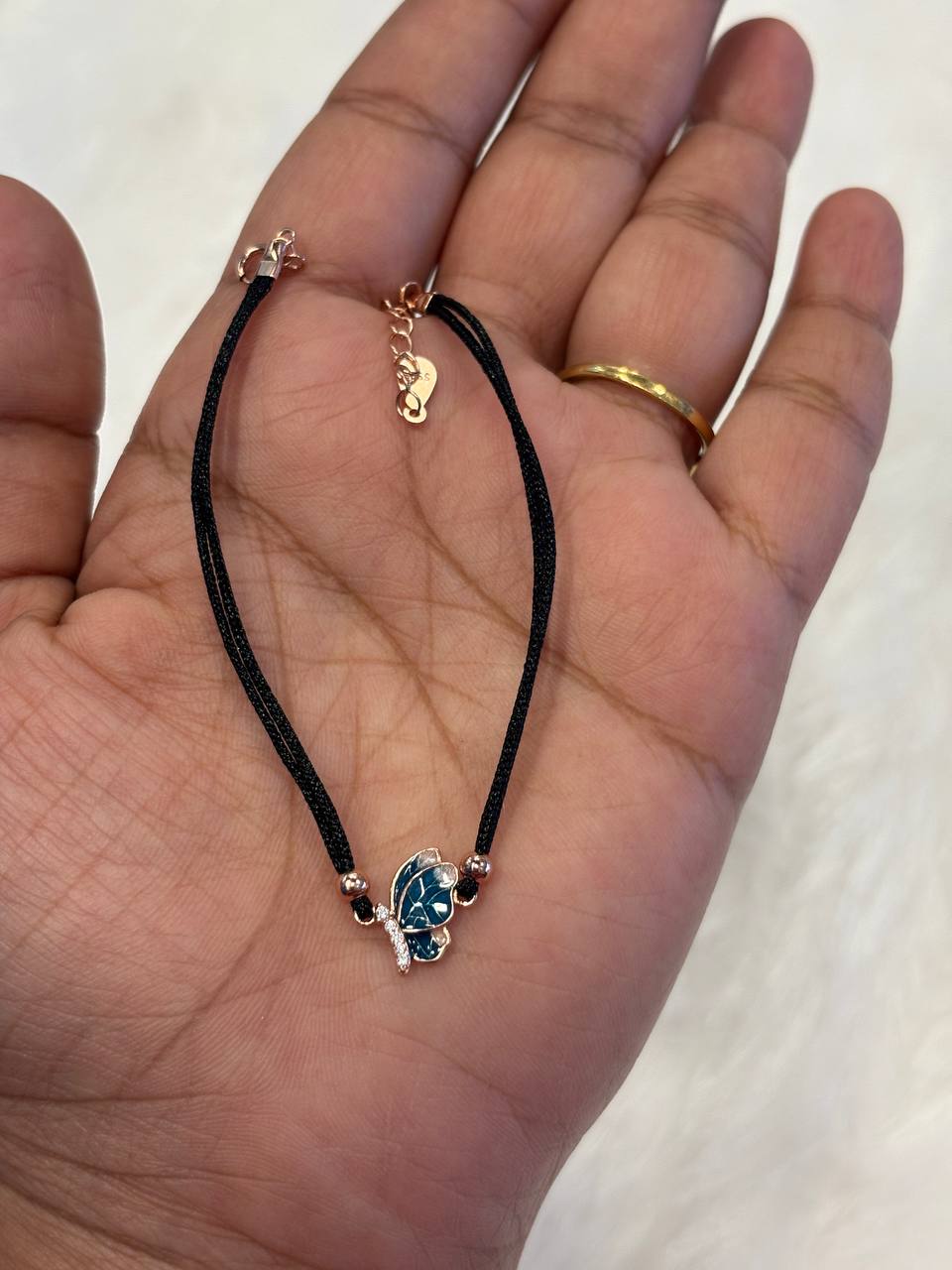 Silver black rope butterfly bracelet with rose gold finish