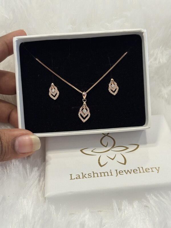 Silver mayuri pendant set with rosegold finish