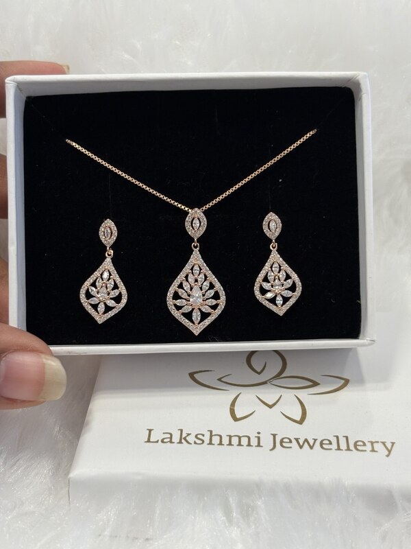 Silver mira pendant set with rosegold finish