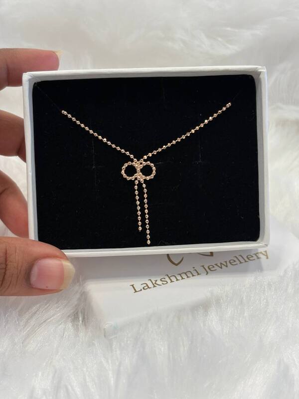 Silver bow 1 chain with rosegold finish