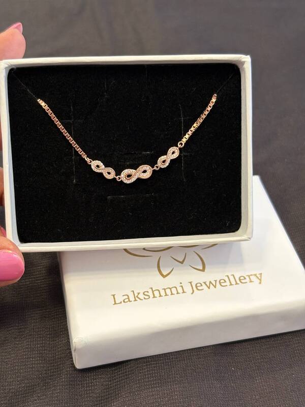 Silver infinity bracelet with rosegold finish