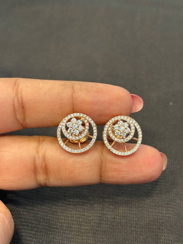 Silver fancy round flower stud with rosegold finish